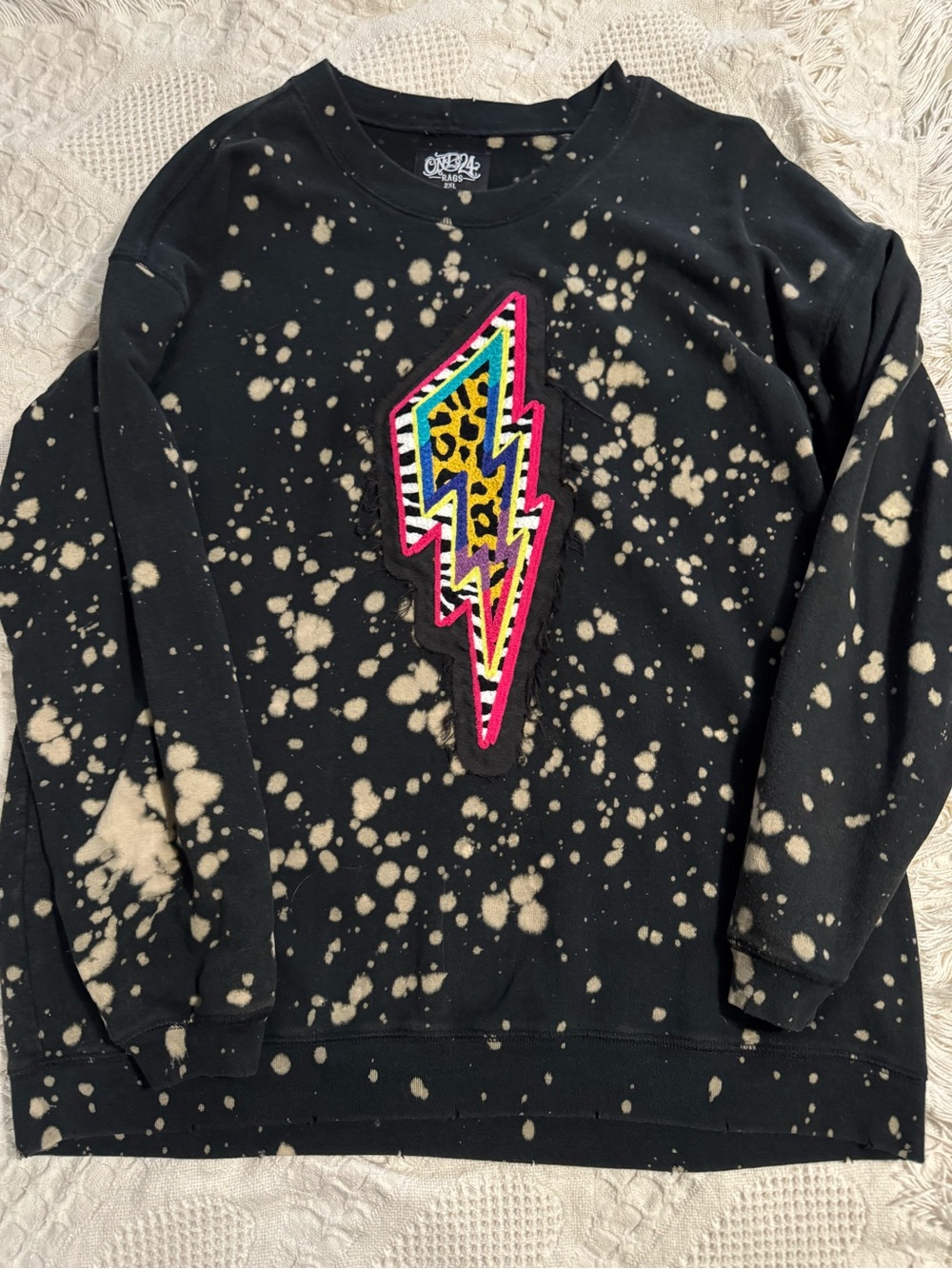 Boutique Bleach-Splatter Black Sweatshirt with Neon Lightning Patch